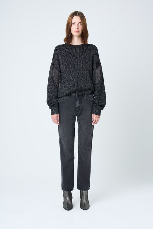 Jean Vega en black denim para mujer detalle cuero